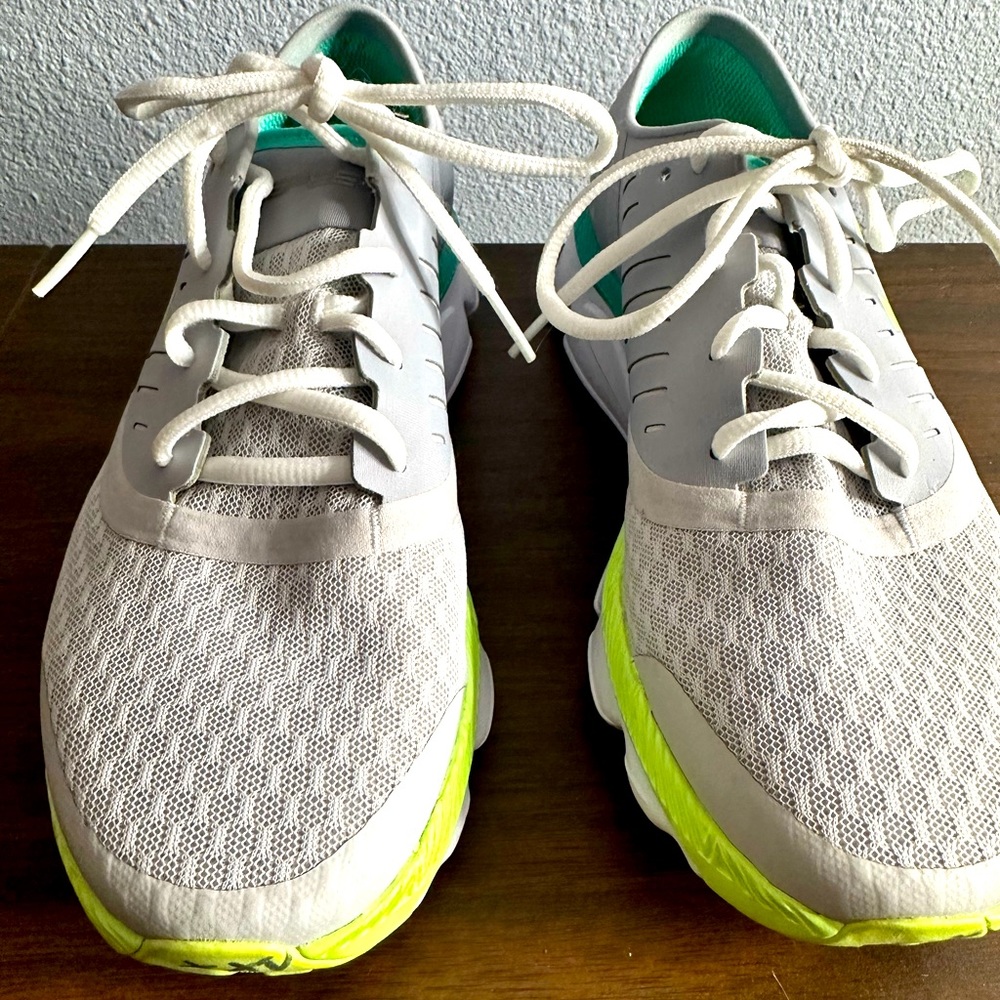 Under Armour White Athletic Shoes with Neon Yellow and Teal Accents